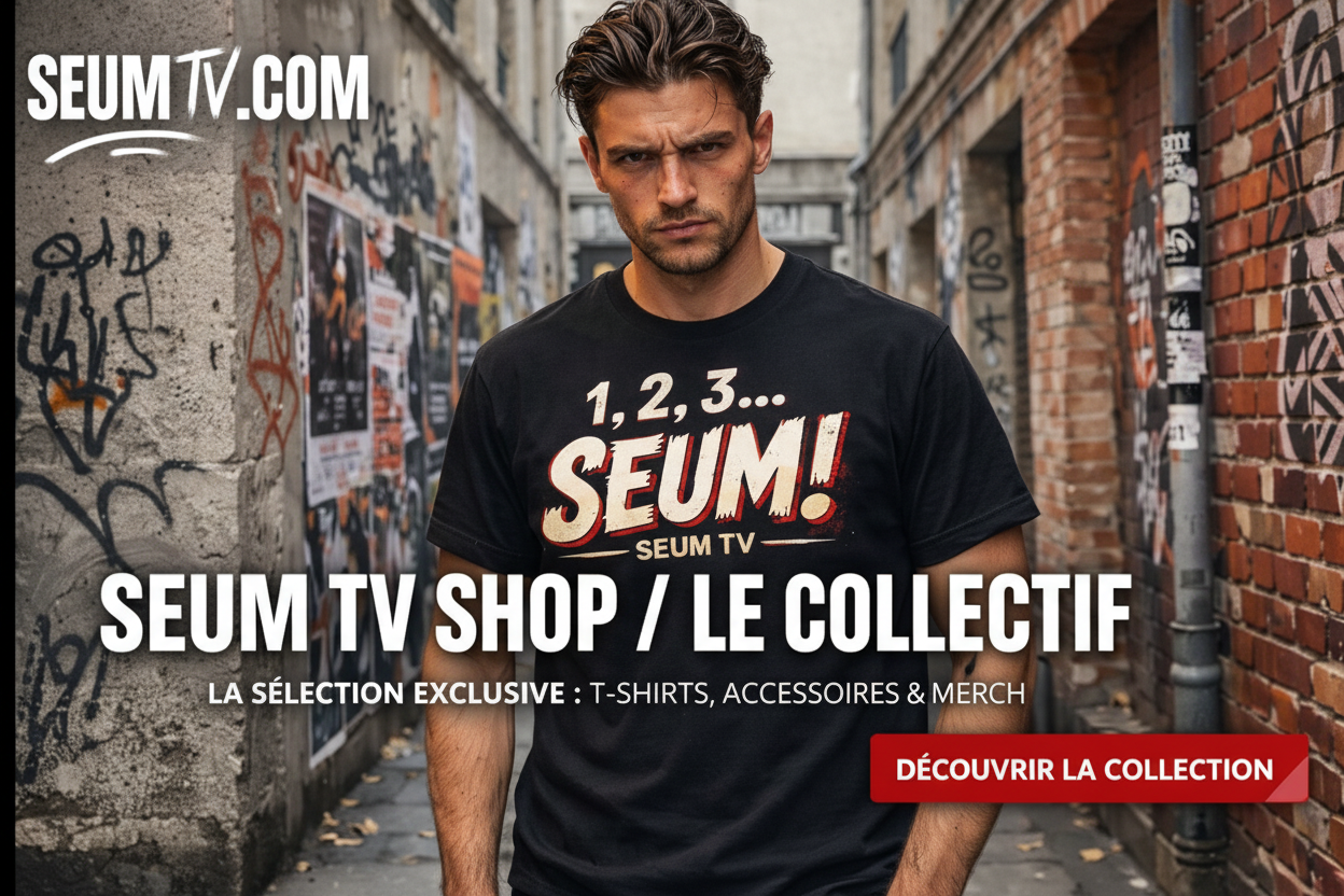 Homme portant un t-shirt noir SEUM TV dans une ruelle urbaine, visuel streetwear football pour la boutique SEUM TV.